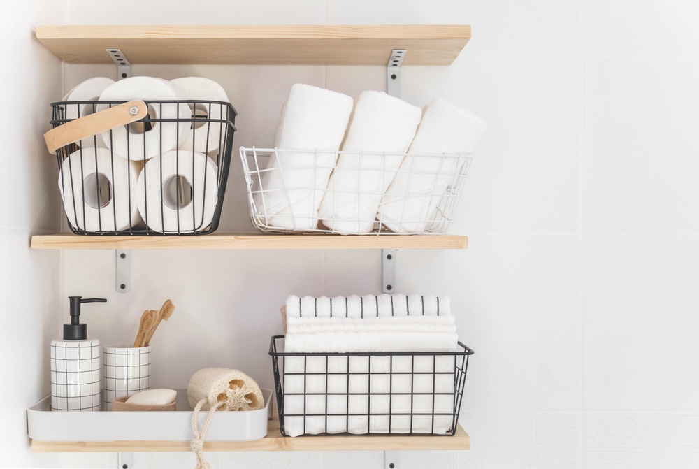 bathroom storage with bright neutral colors